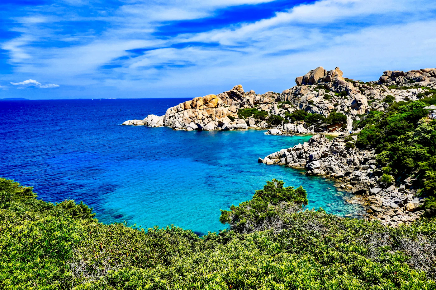 Turquoise water among granite rocks in Sardinia